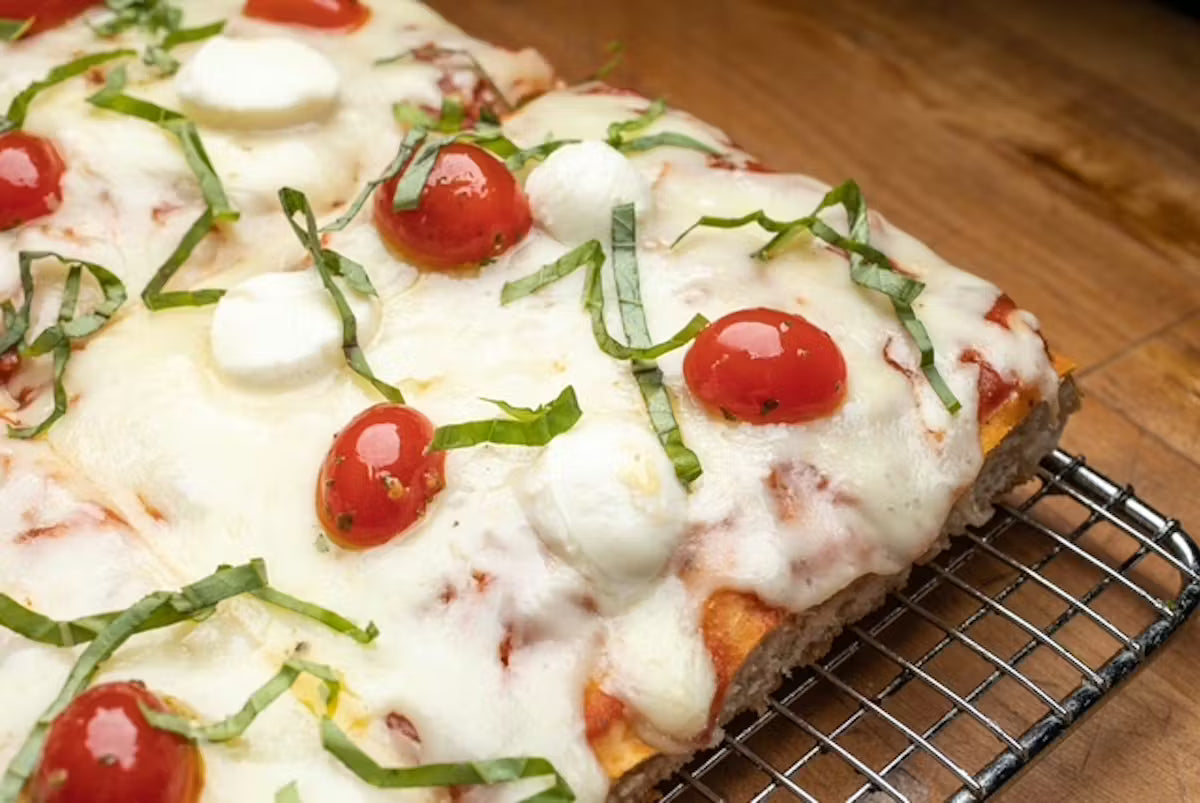 Slices Margherita pizza prepared for a casual pizza party