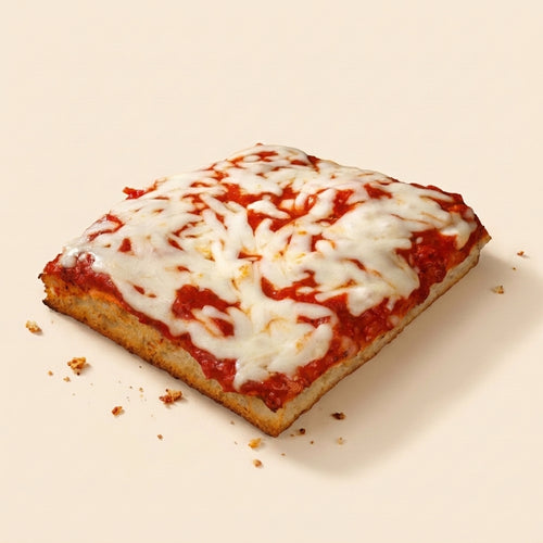 A square slice of pizza with melted white cheese and red tomato sauce, photographed on a clean warm beige background with a few crumbs nearby.